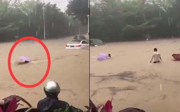 厦门女子暴雨中被洪水淹没冲走 危急时刻的哥飞身救人现场
